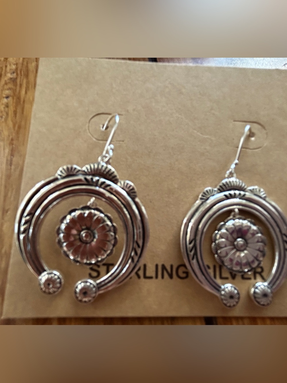 Sterling over brass dangle earrings.